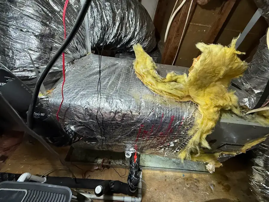 Attic HVAC unit wrapped for service